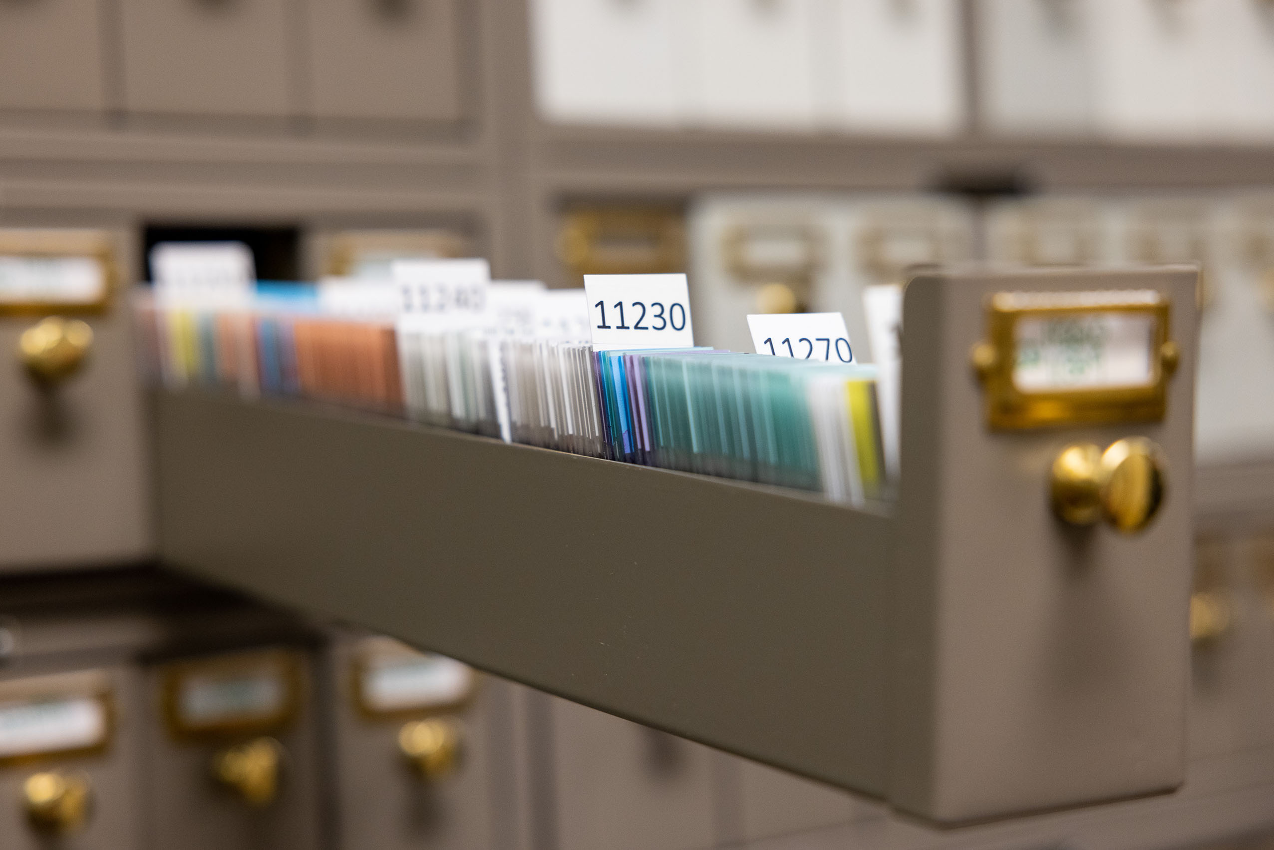 An open drawer of slides in AP records