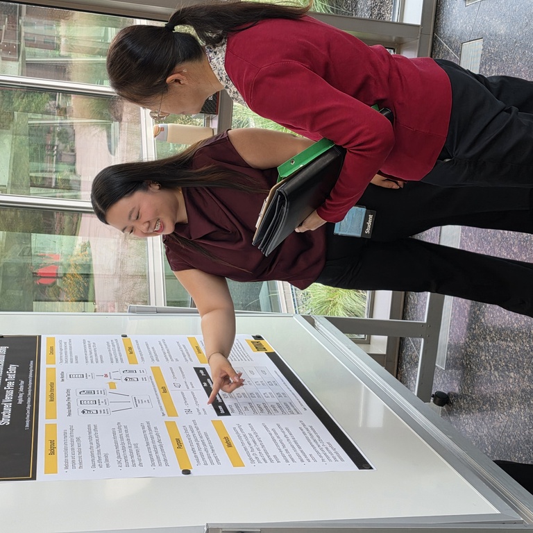 Dr. Shujie Yang with Angela Wong at the 2026 Medical Student Research Conference