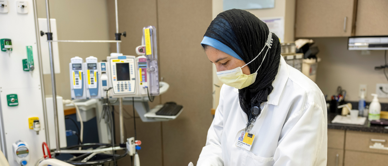 A phlebotomist preparing their equipment