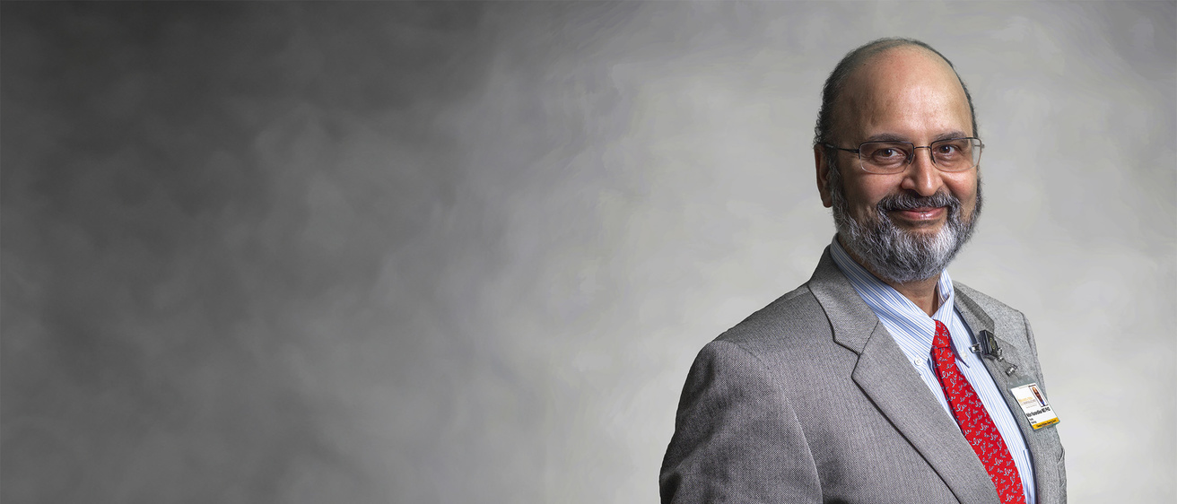 Dr. Karandikar