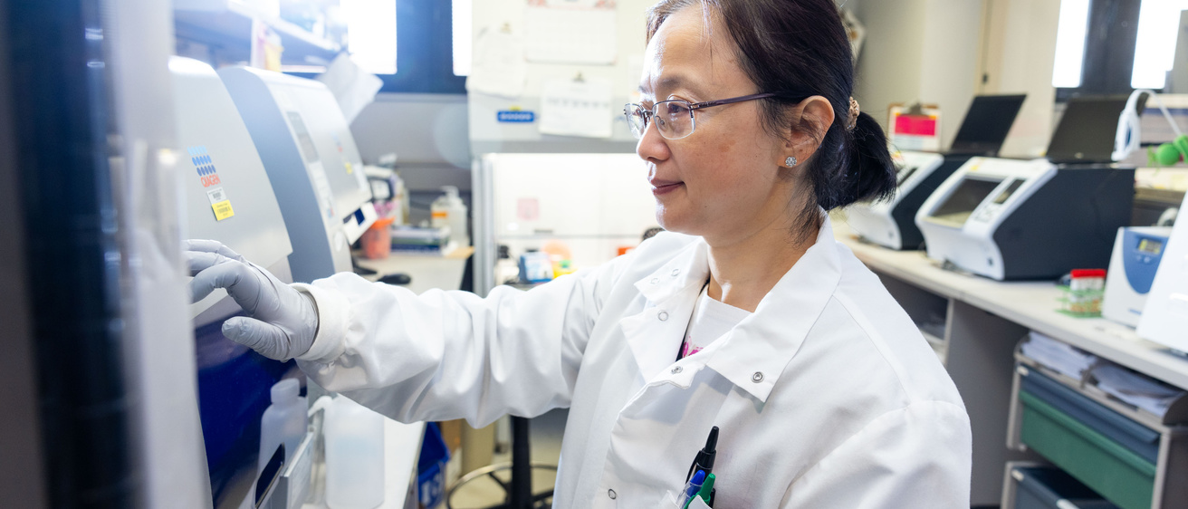 A person using lab equipment in the Micro lab